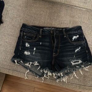 Ripped denim shorts
